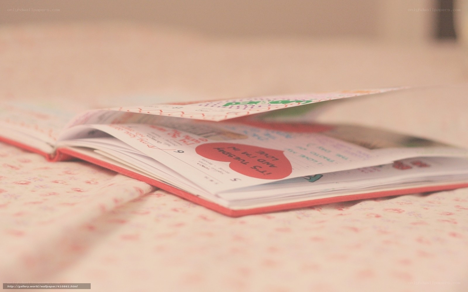 open book on floral bed