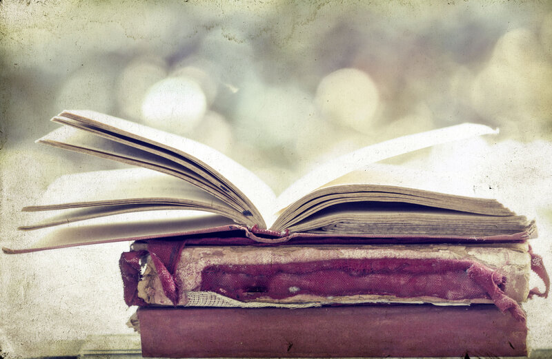 Open Book on Stack — Brown