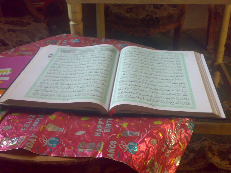 Open Book on Table — Red