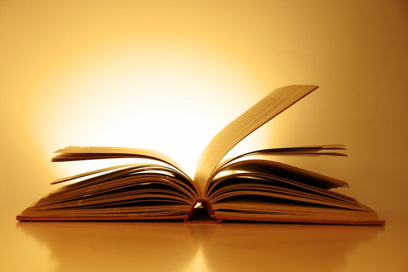 Open Book on Table — Yellow