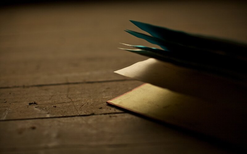 open book on wooden surface