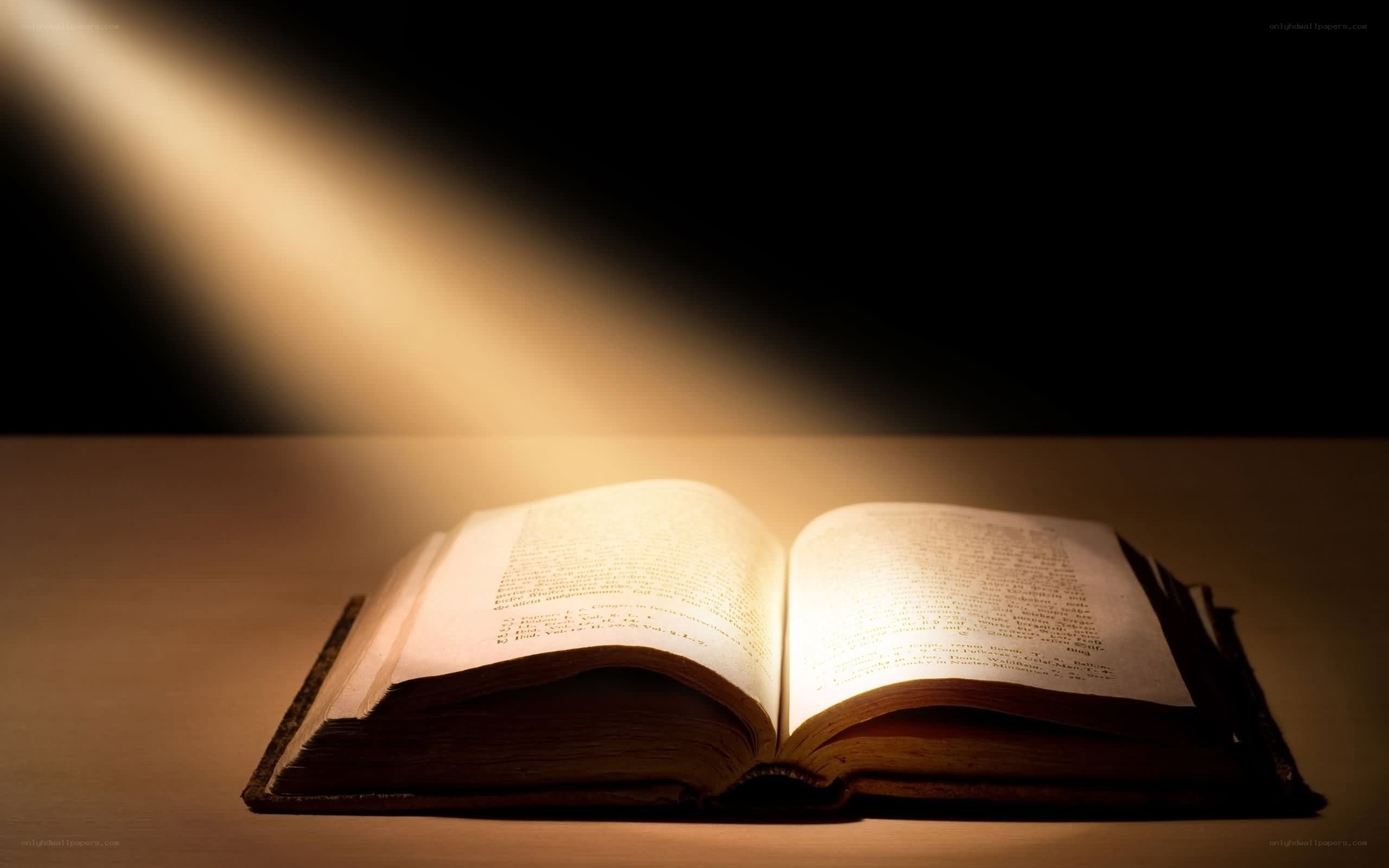 open book under spotlight