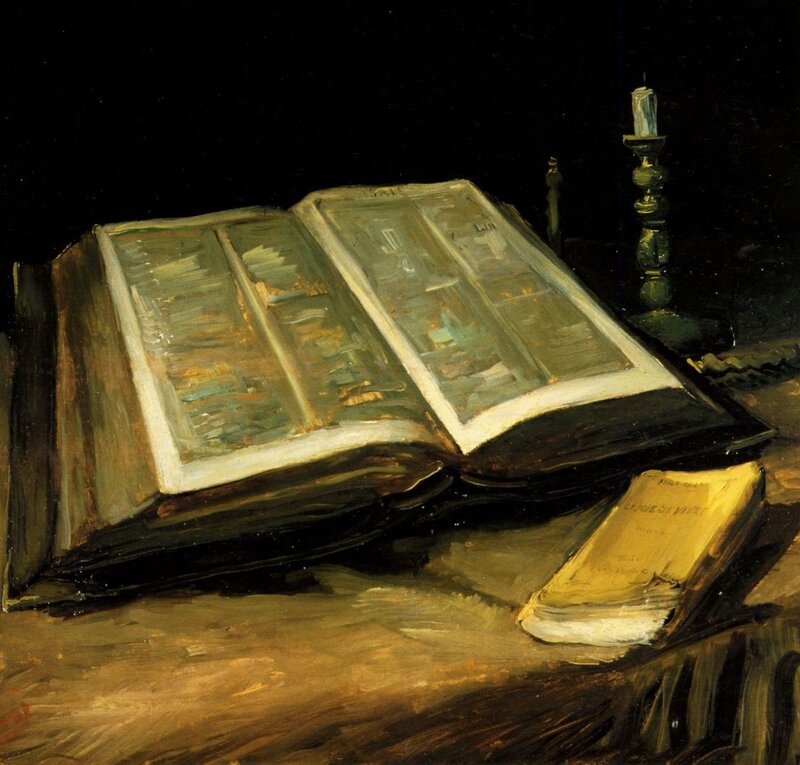 Open book with candle