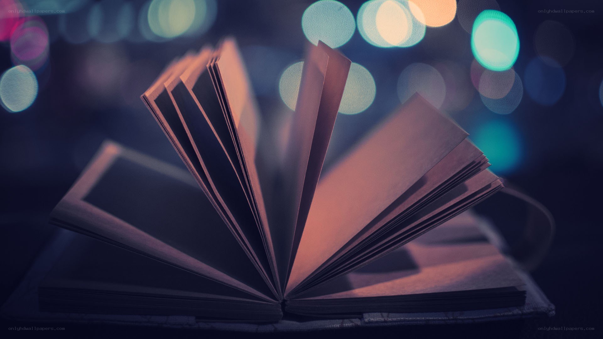 open book with city lights