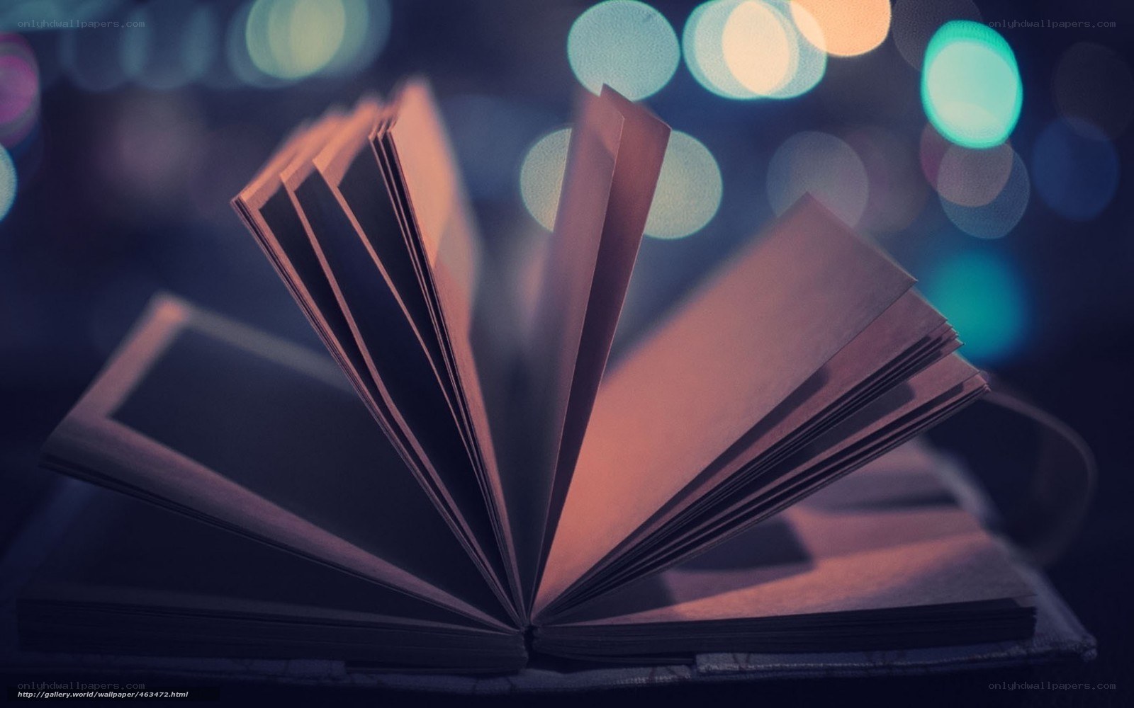 open book with city lights