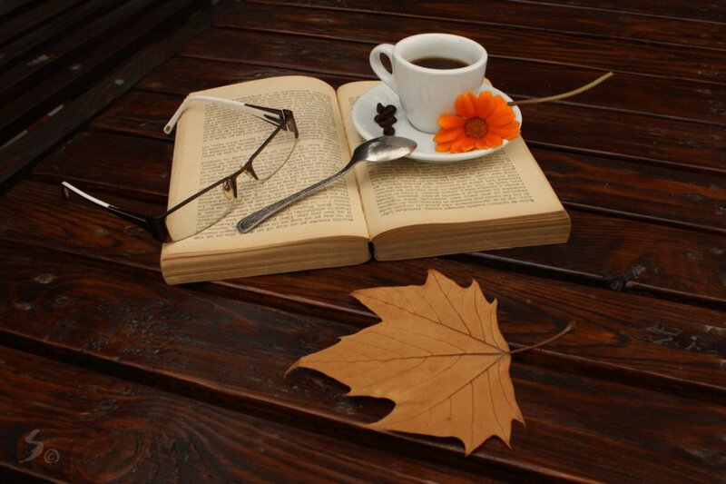 Open Book with Coffee Cup