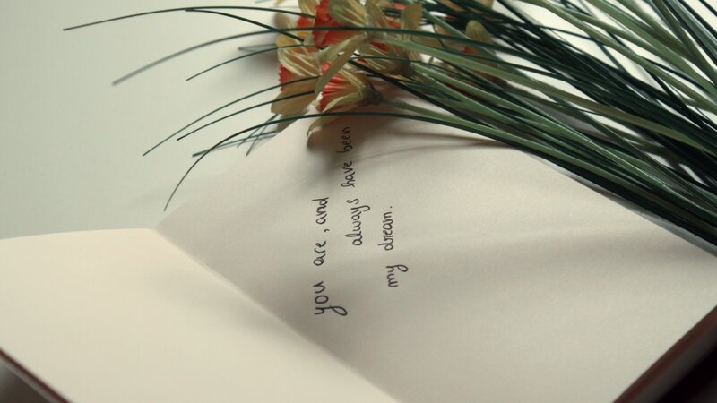 Open Book with Flowers — White, Serene, Photograph, Handwriting
