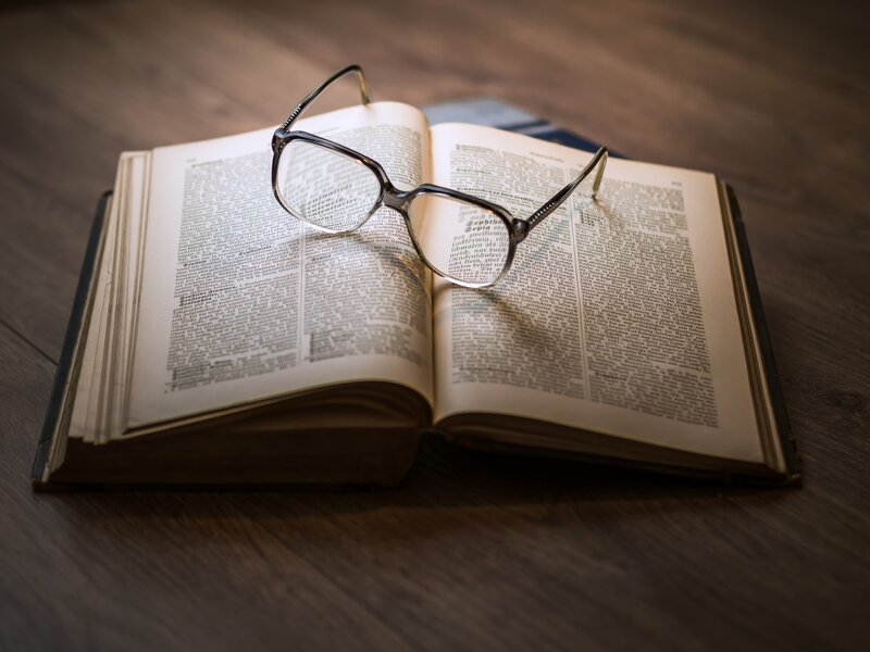 Open Book with Glasses — Brown, Calm
