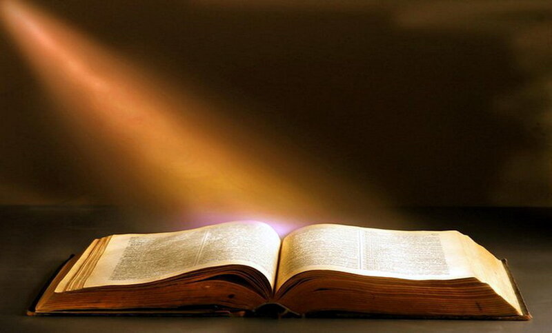 Open Book with Light Beam