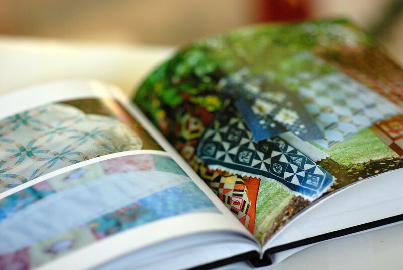 open book with quilt patterns
