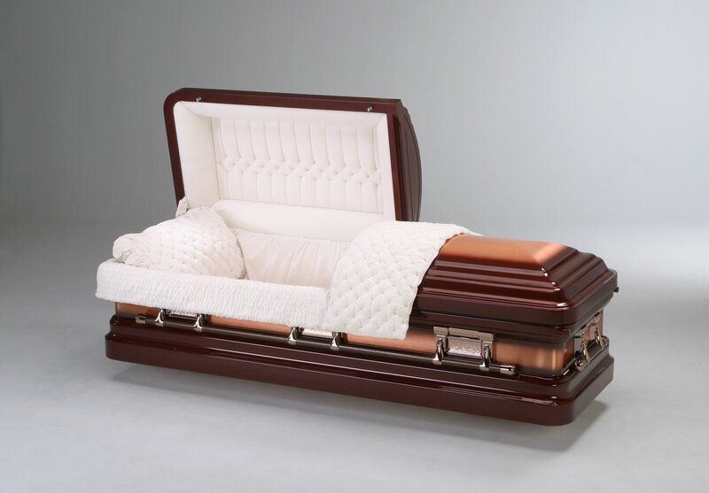 Open casket with white interior