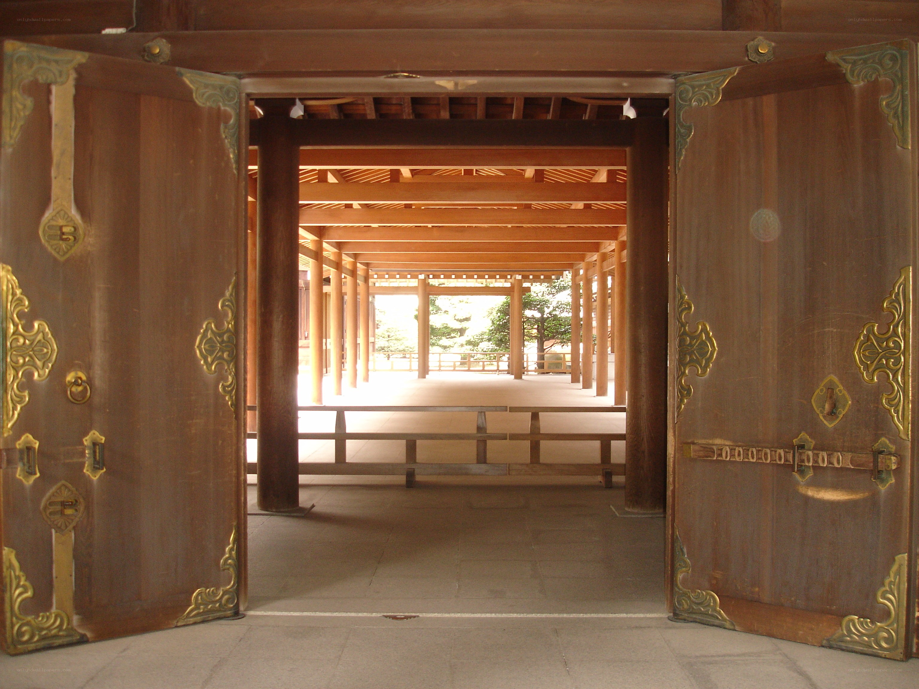 Open doors to a temple corridor