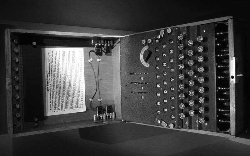 open enigma machine with instruction sheet