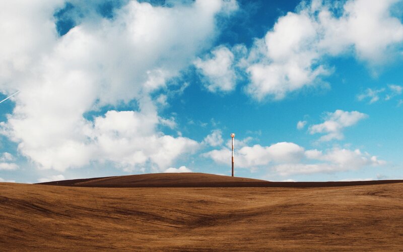 Open field with communication tower