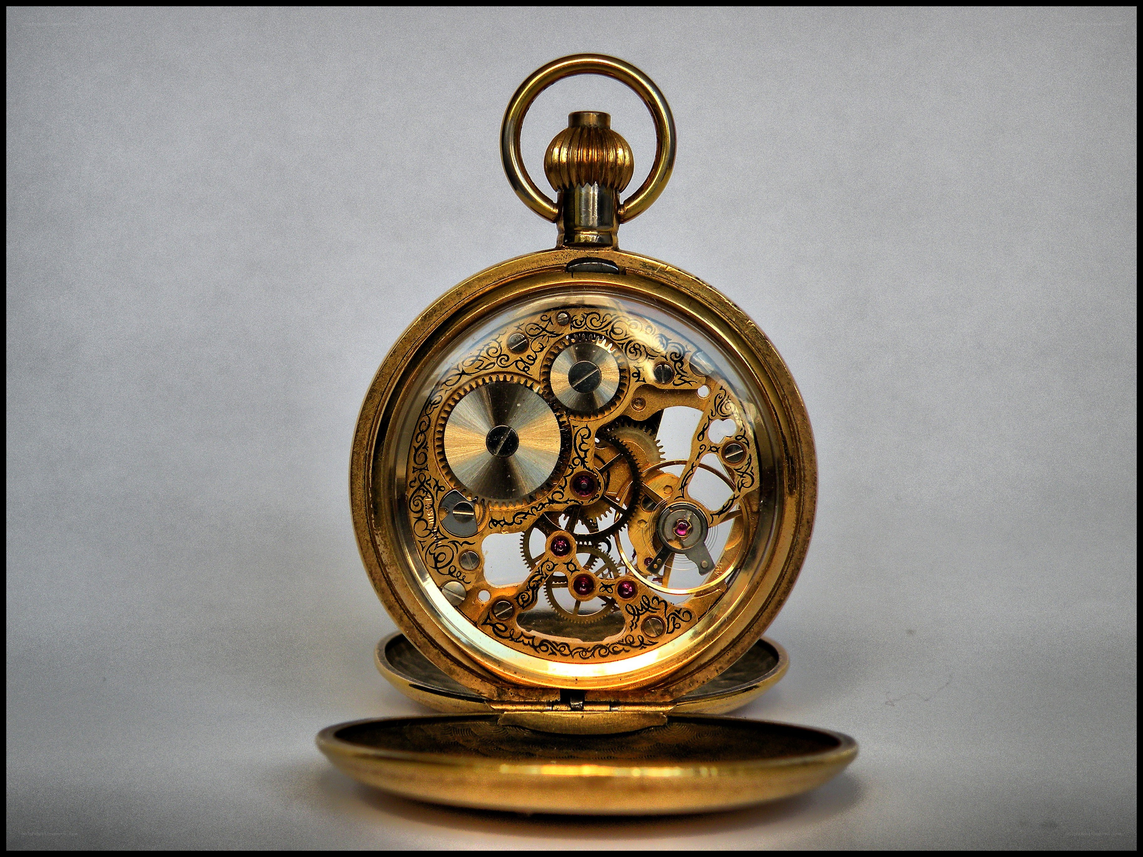 Open gold pocket watch