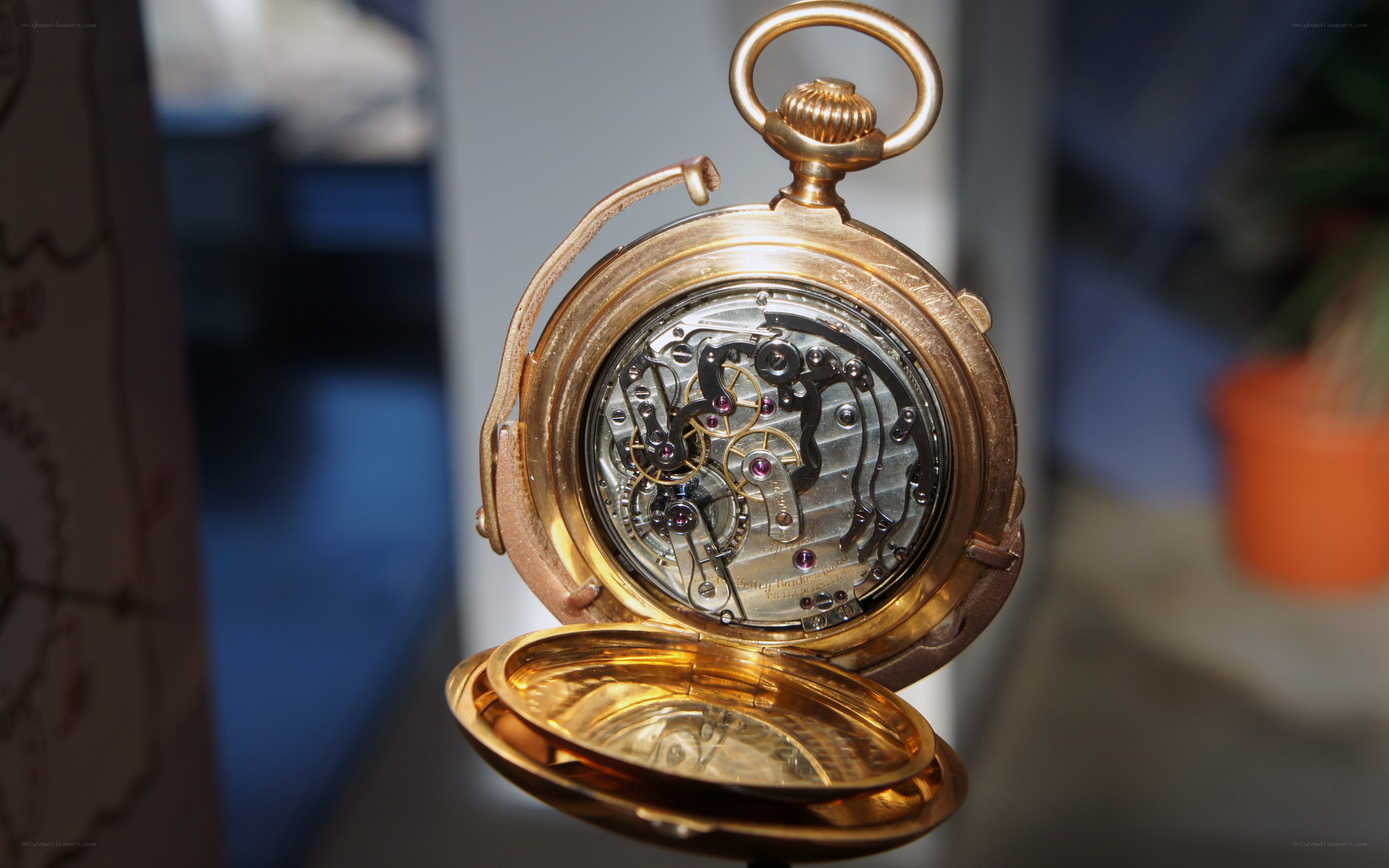 Open gold pocket watch