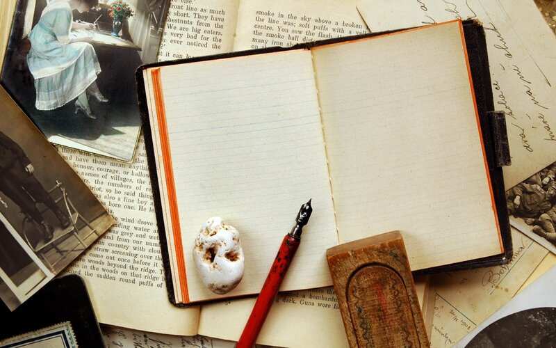 Open Notebook with Pen — Brown