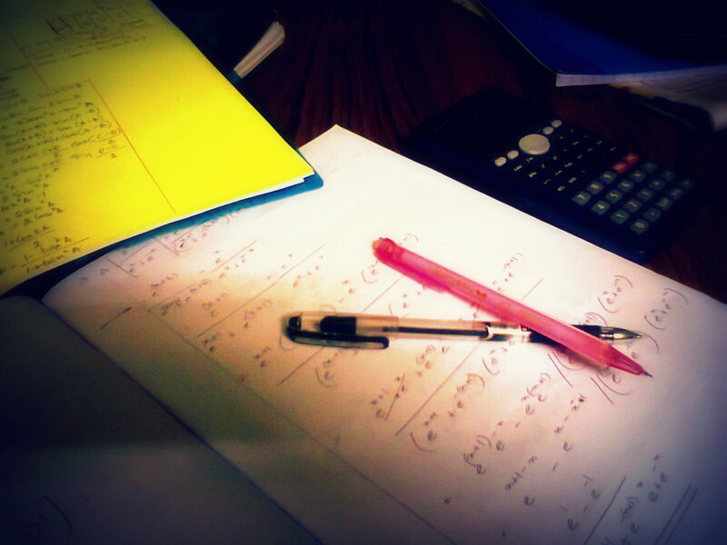 Open Notebook with Pens