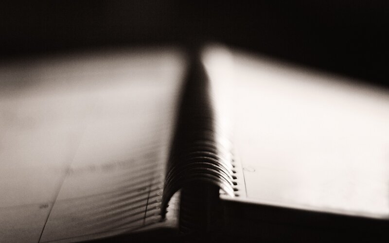 open notebook with spiral binding