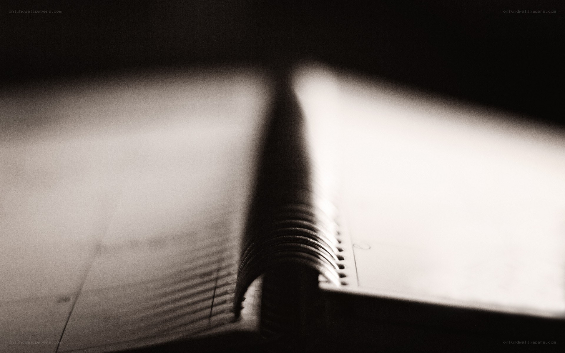 open notebook with spiral binding
