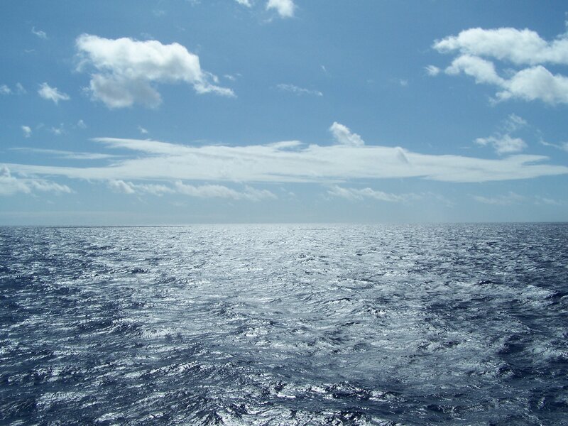 Open ocean under blue sky