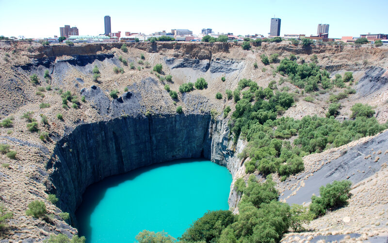 Open-pit mine with turquoise water