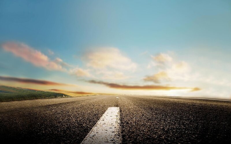 open road at sunset