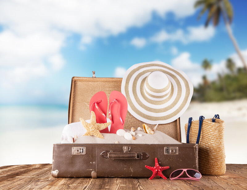 Open Suitcase on Beach