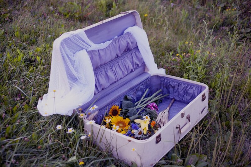 Open Suitcase with Flowers