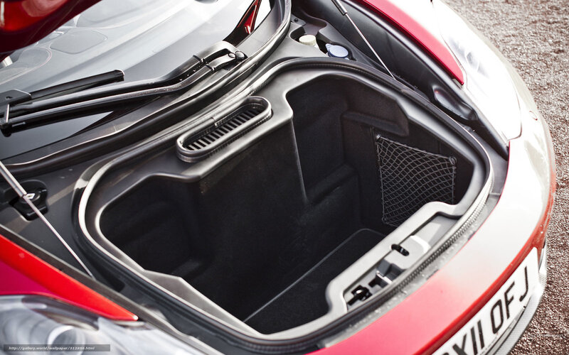 open trunk of red sports car
