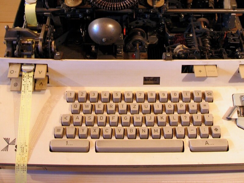 Open typewriter mechanism
