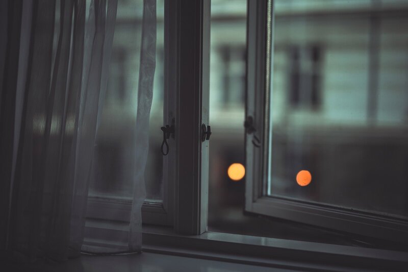 Open Window with Curtains