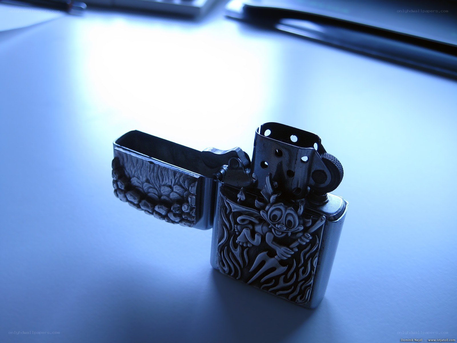 open zippo lighter with carving
