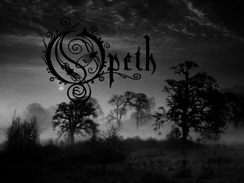 Opeth band logo in a misty forest