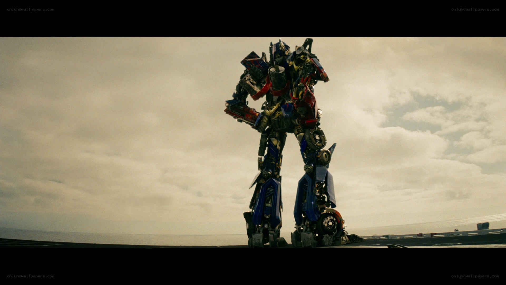 Optimus Prime stands on a ship