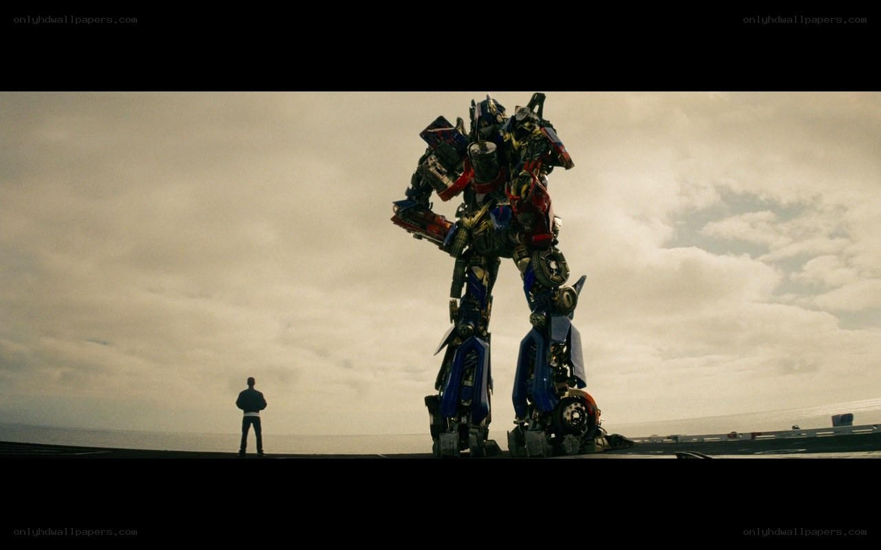 Optimus Prime stands on a ship