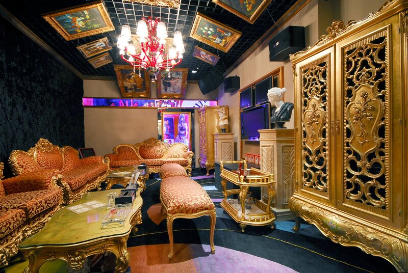 opulent lounge with gold furniture