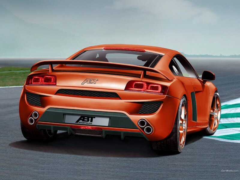 Orange ABT sports car on track