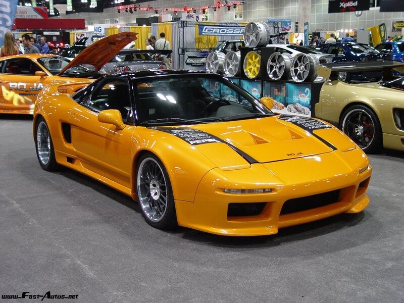 Orange Acura NSX at car show