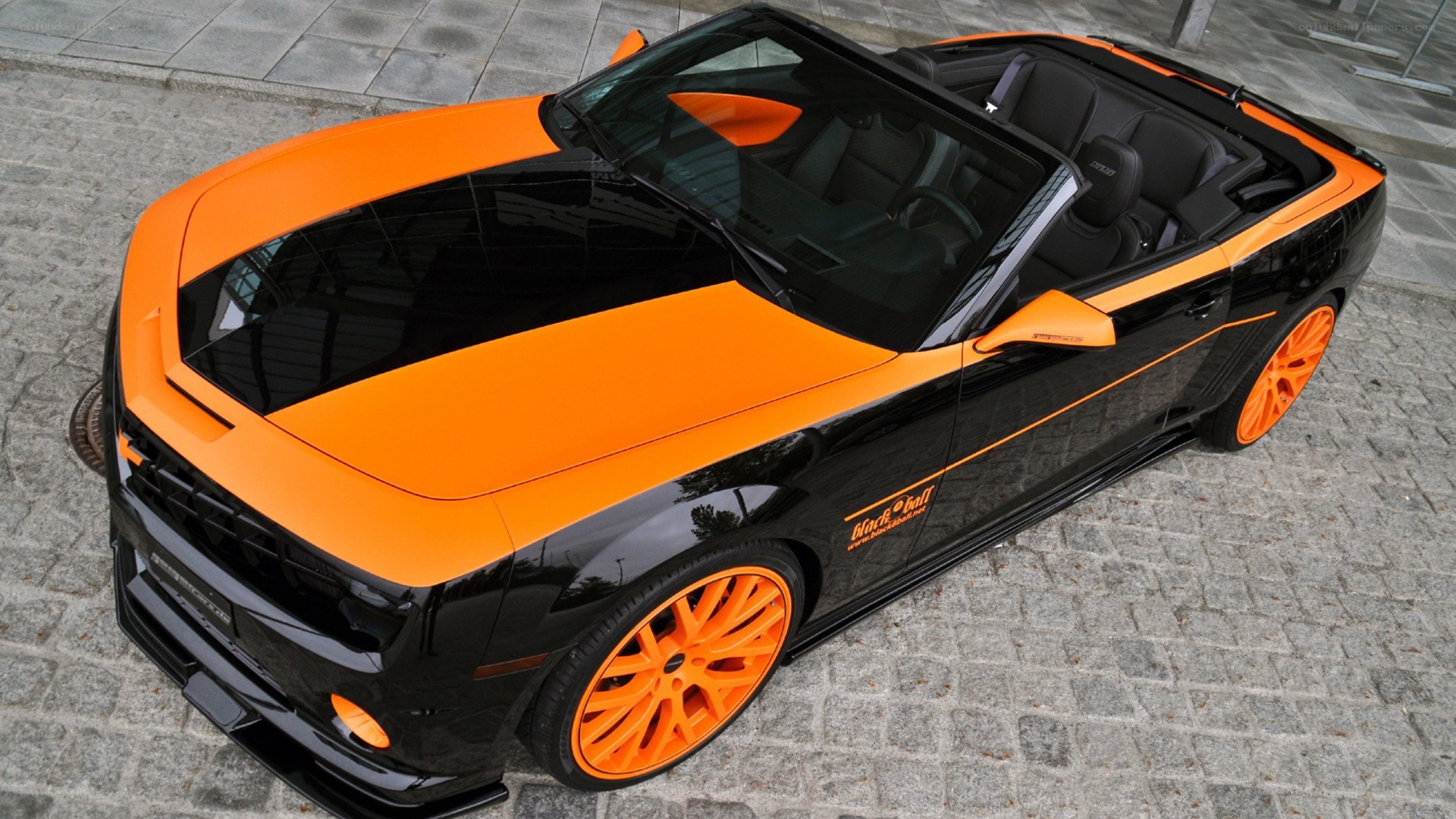 orange and black convertible car
