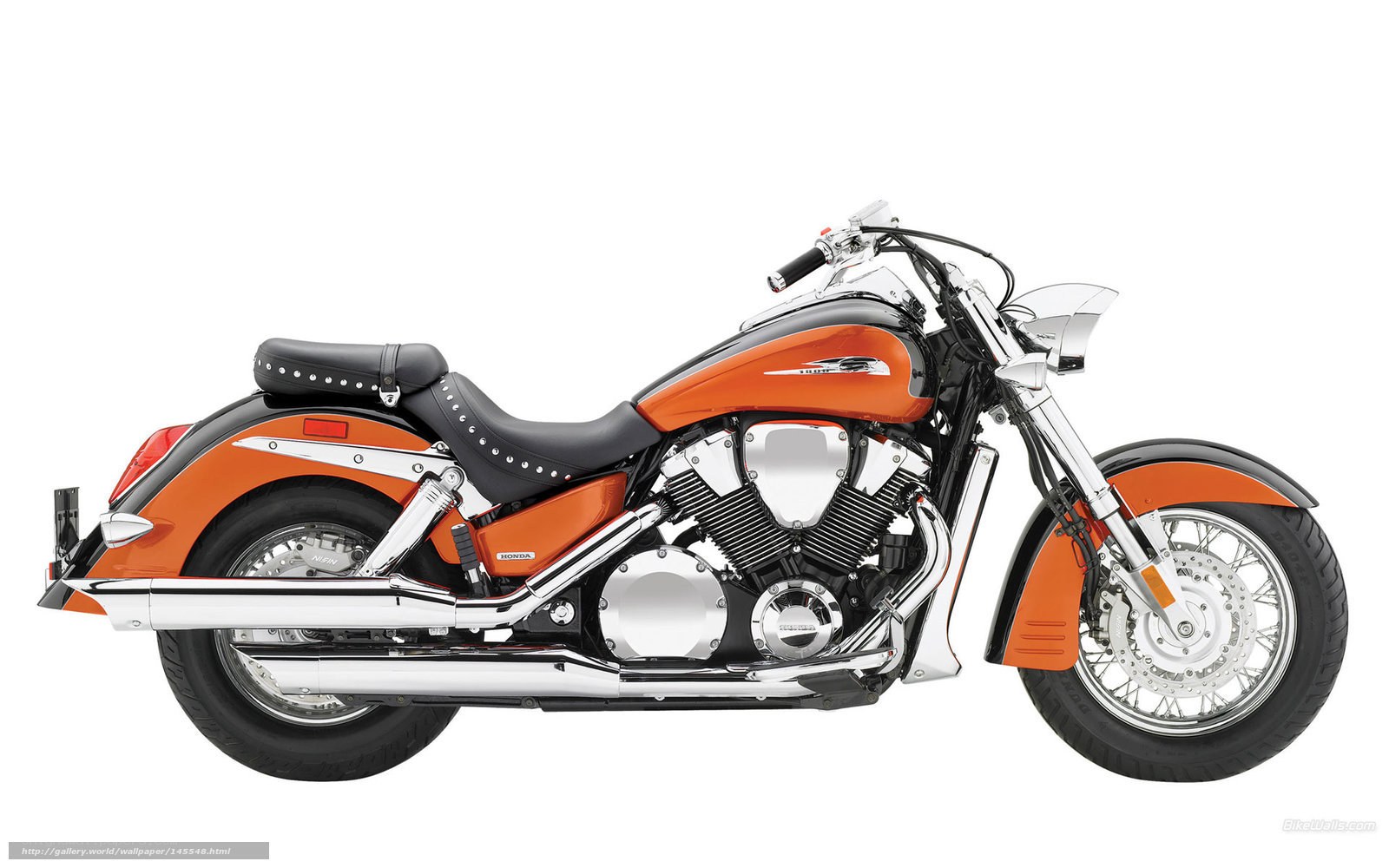 orange and black cruiser motorcycle