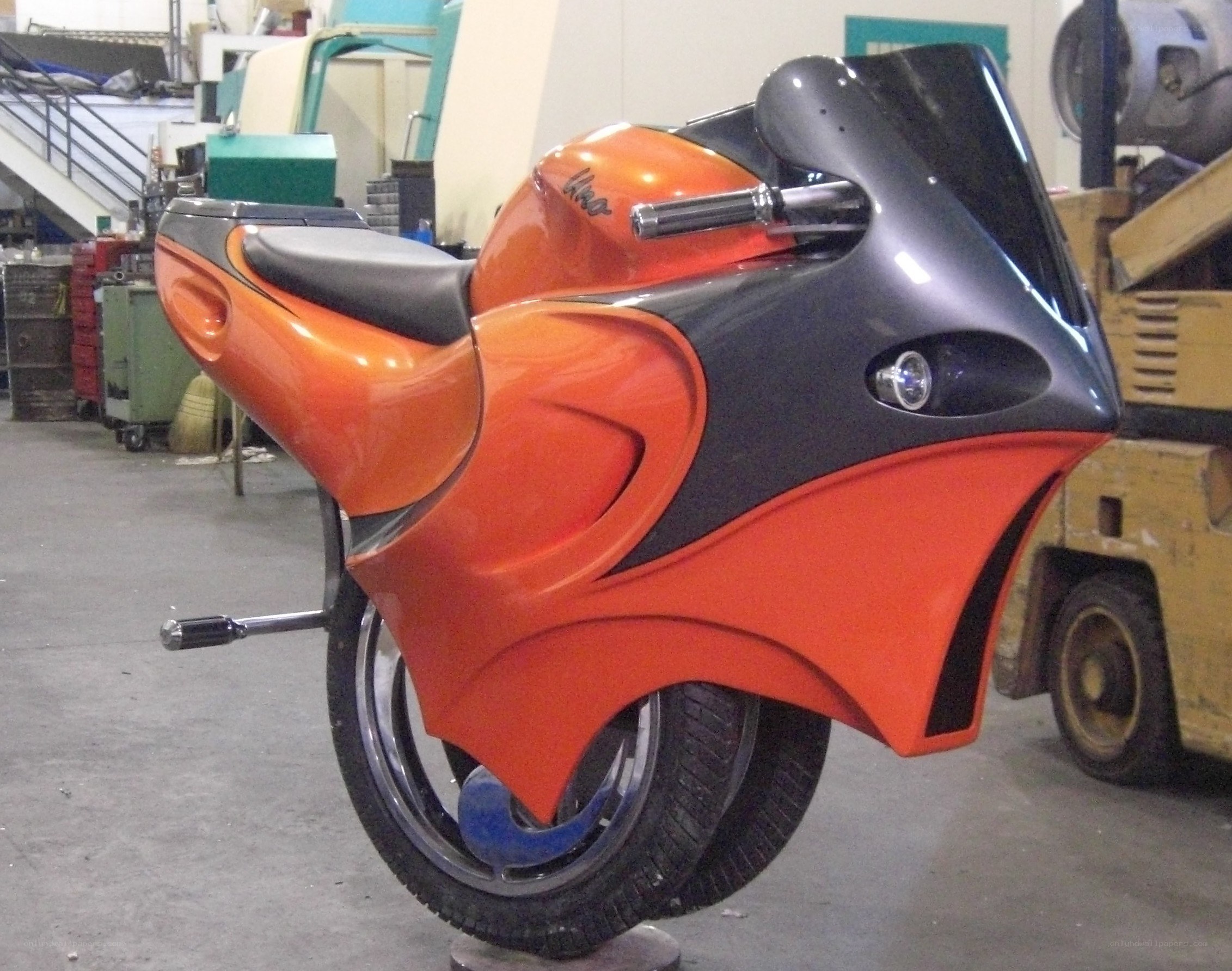 orange and black custom motorcycle