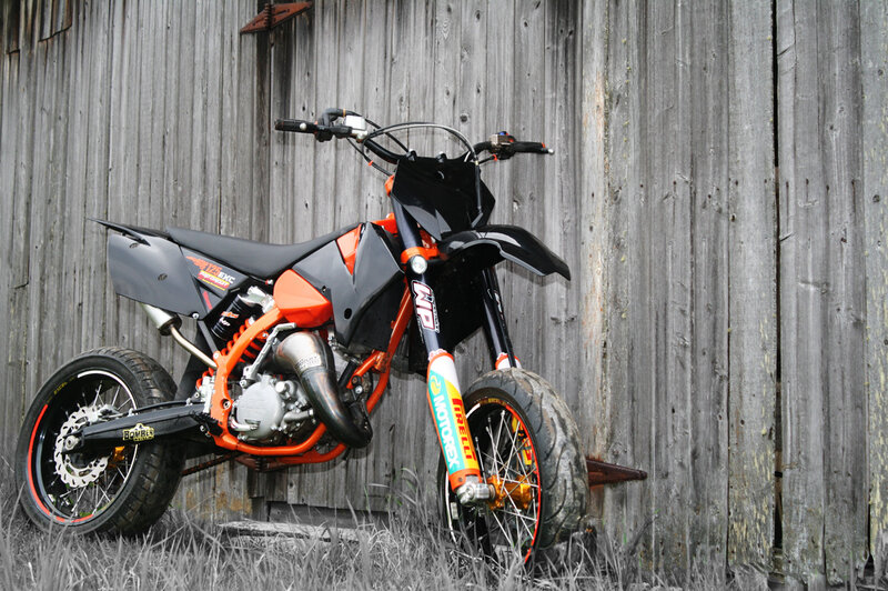 orange and black dirt bike
