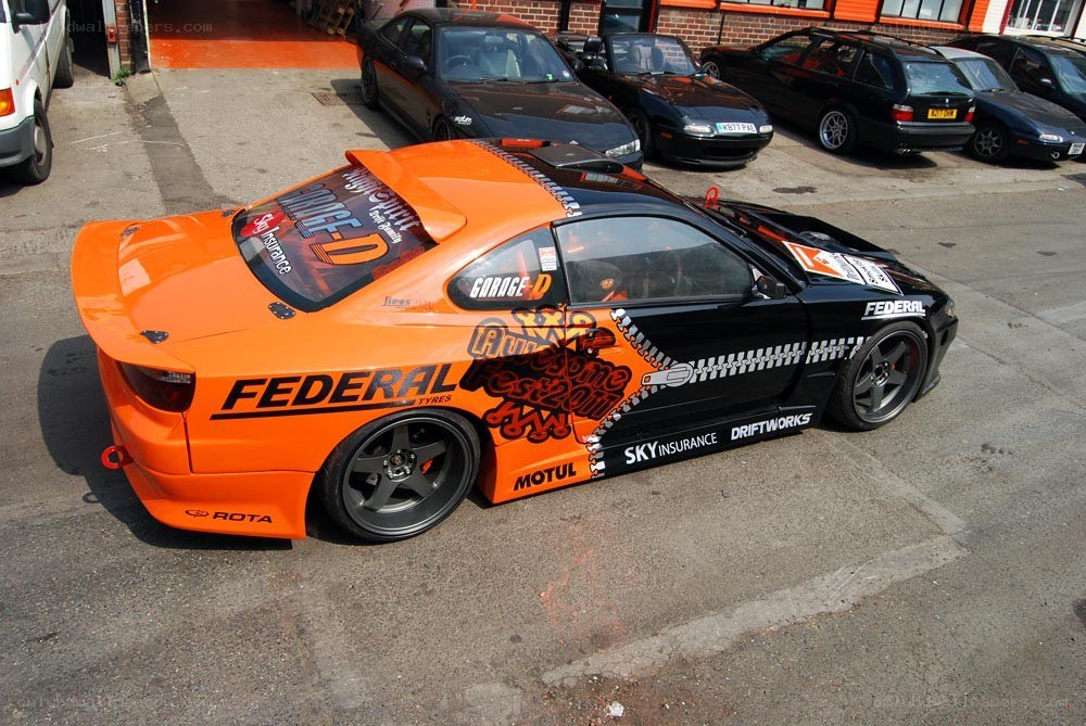 orange and black drift car