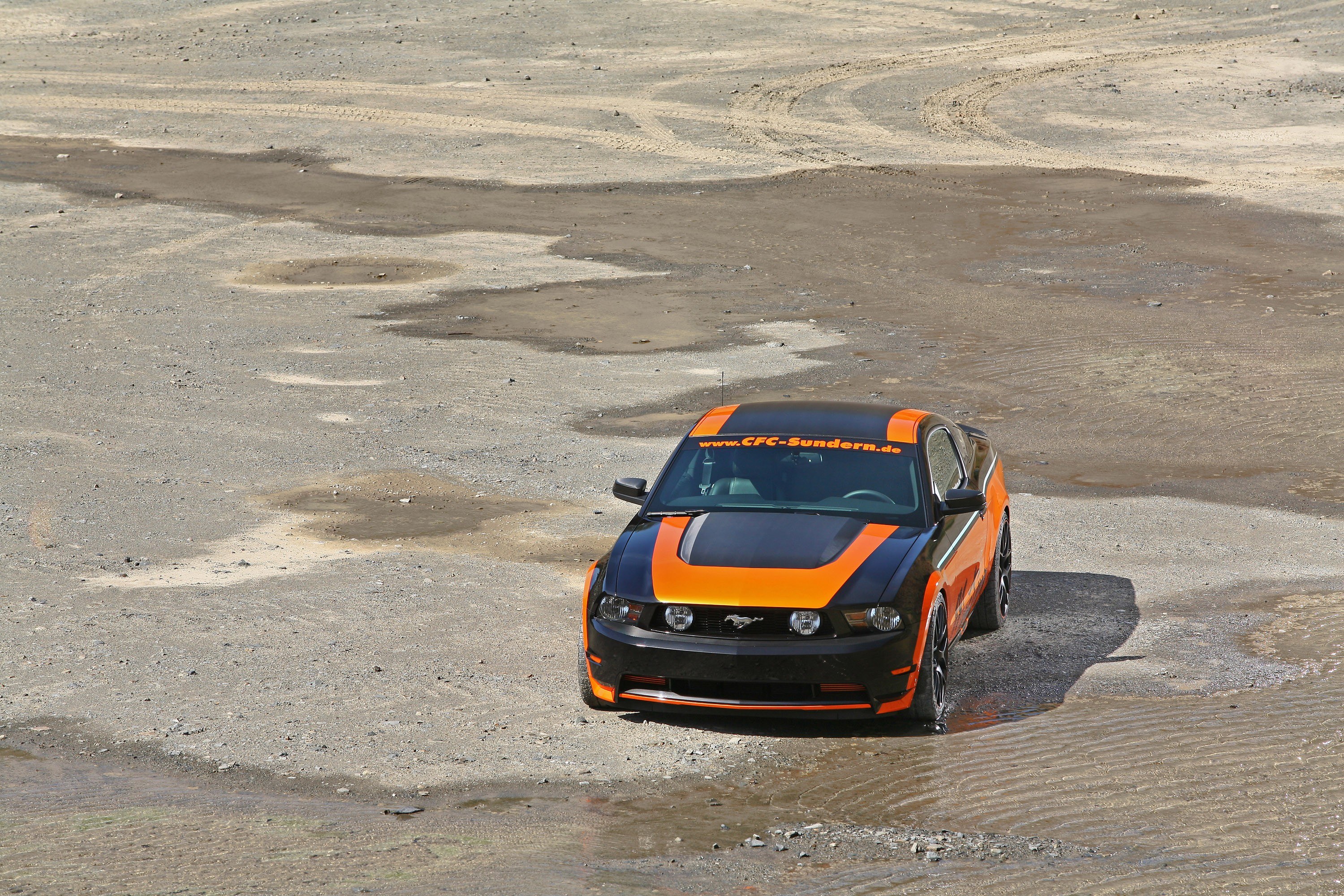 Orange and black Ford Mustang