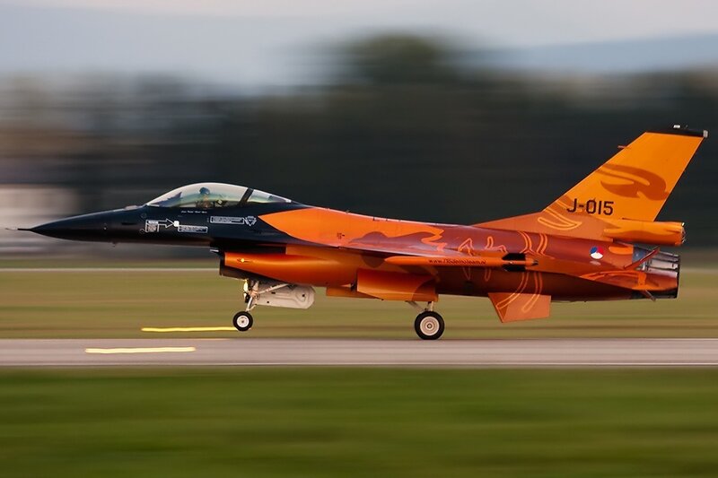 Orange and Black Jet on Runway