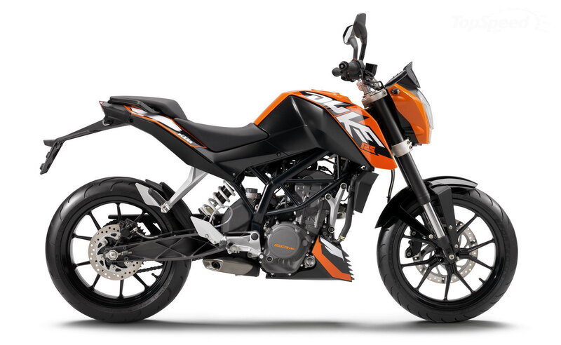 Orange and Black Motorcycle — Neutral, Photograph, Seat, Engine, Wheels