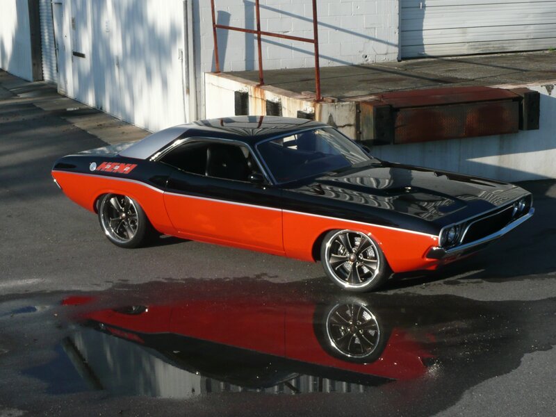 Orange and Black Muscle Car — Dramatic, Afternoon, Photograph, Puddle, Building