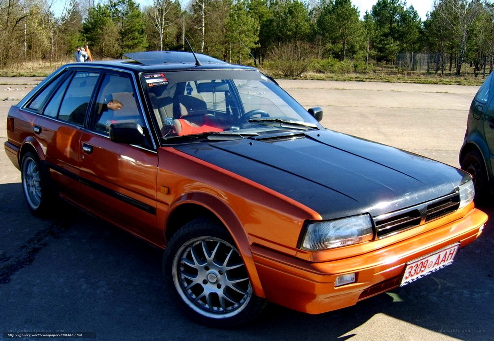 Orange and black sedan car