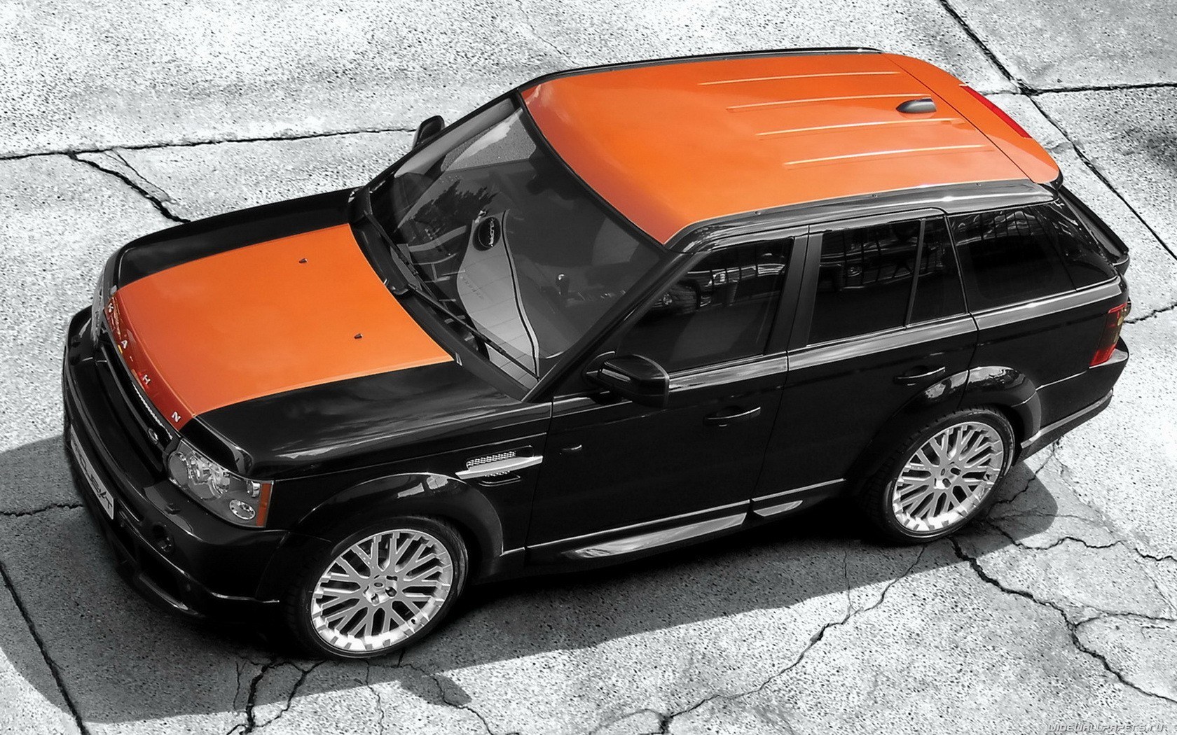 orange and black SUV